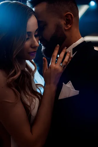 Groom seeing the bride in her wedding dress for the first time