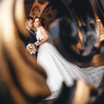 Silhouettes of the newlyweds against a beautiful backdrop